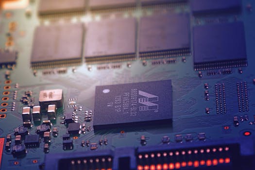 Detailed image of an electronic circuit board showing microchips and intricate wiring in a modern technological setting.